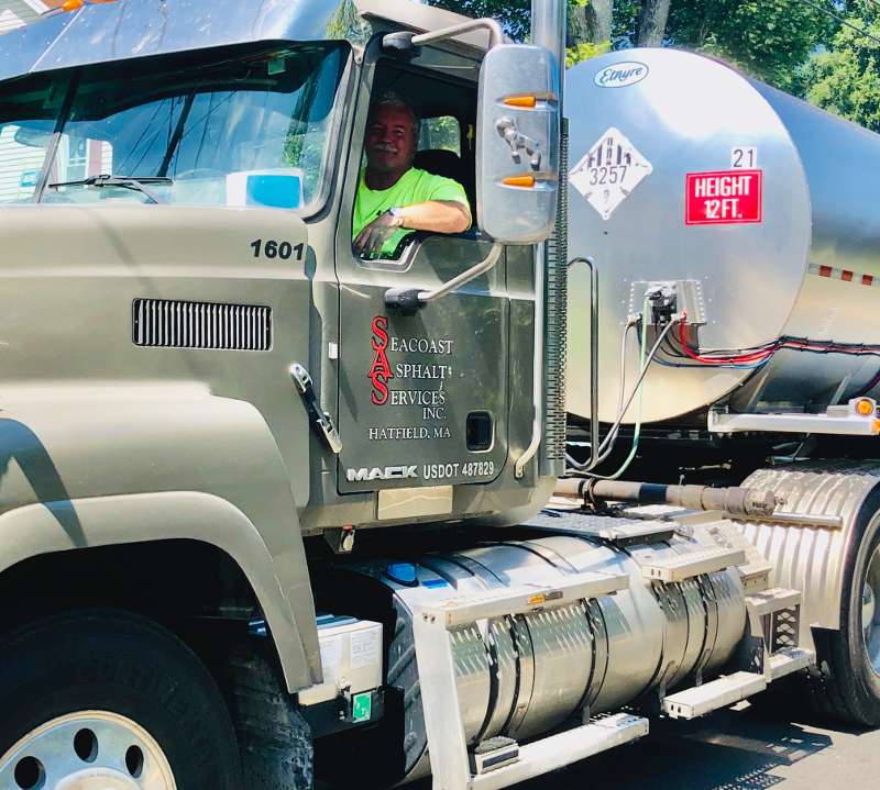 Man in truck - Seacoast Asphalt Services, inc. Hatfield, MA